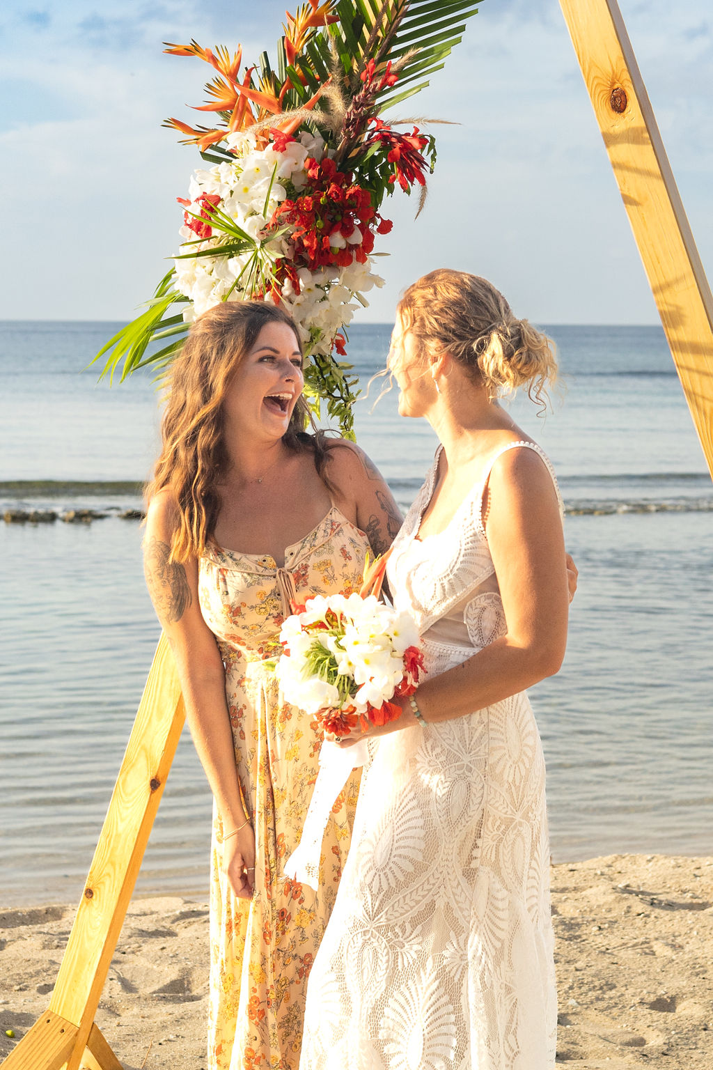 Triangle wedding arch with flowers
