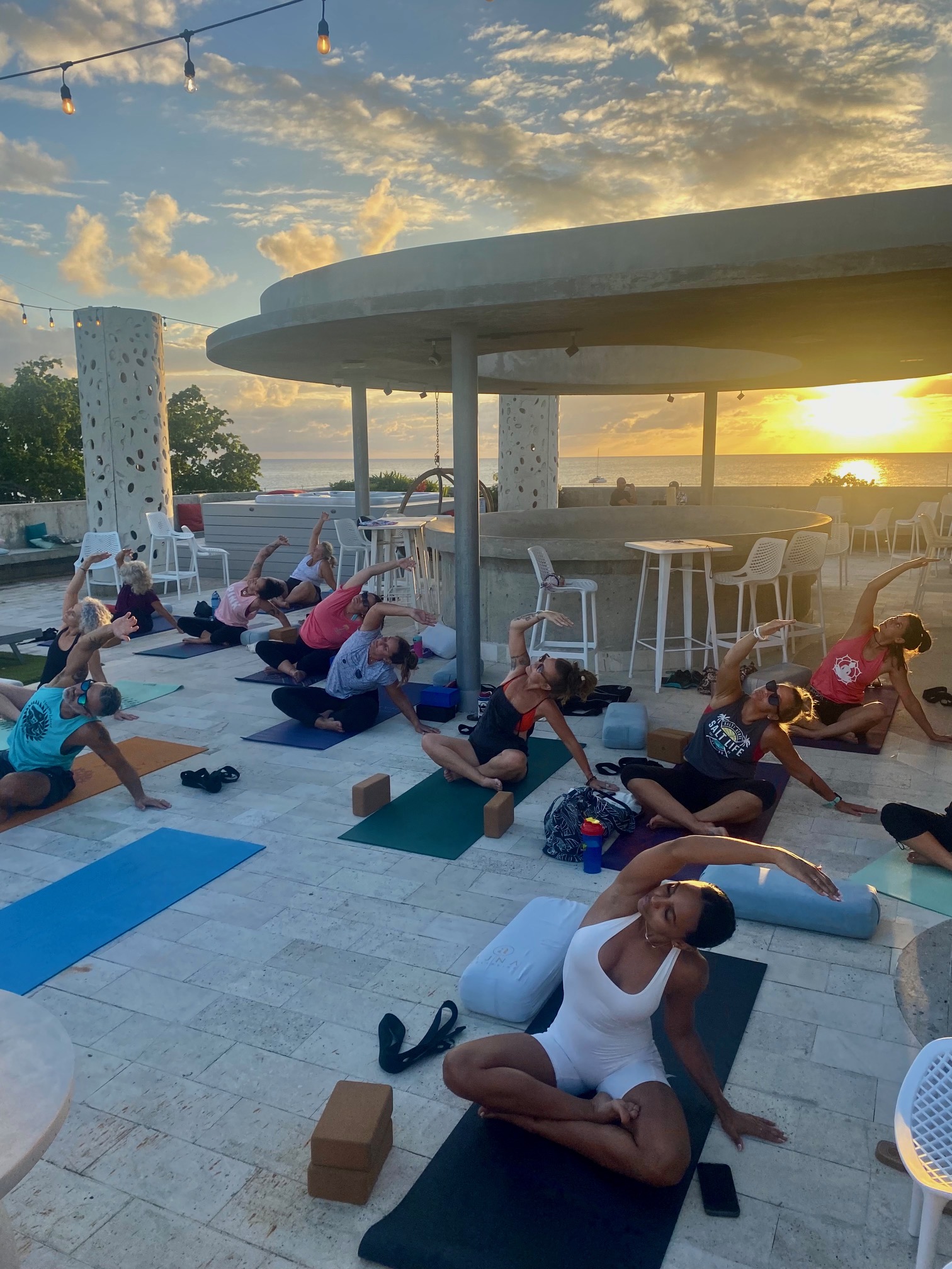 slow flow yoga class at sunset