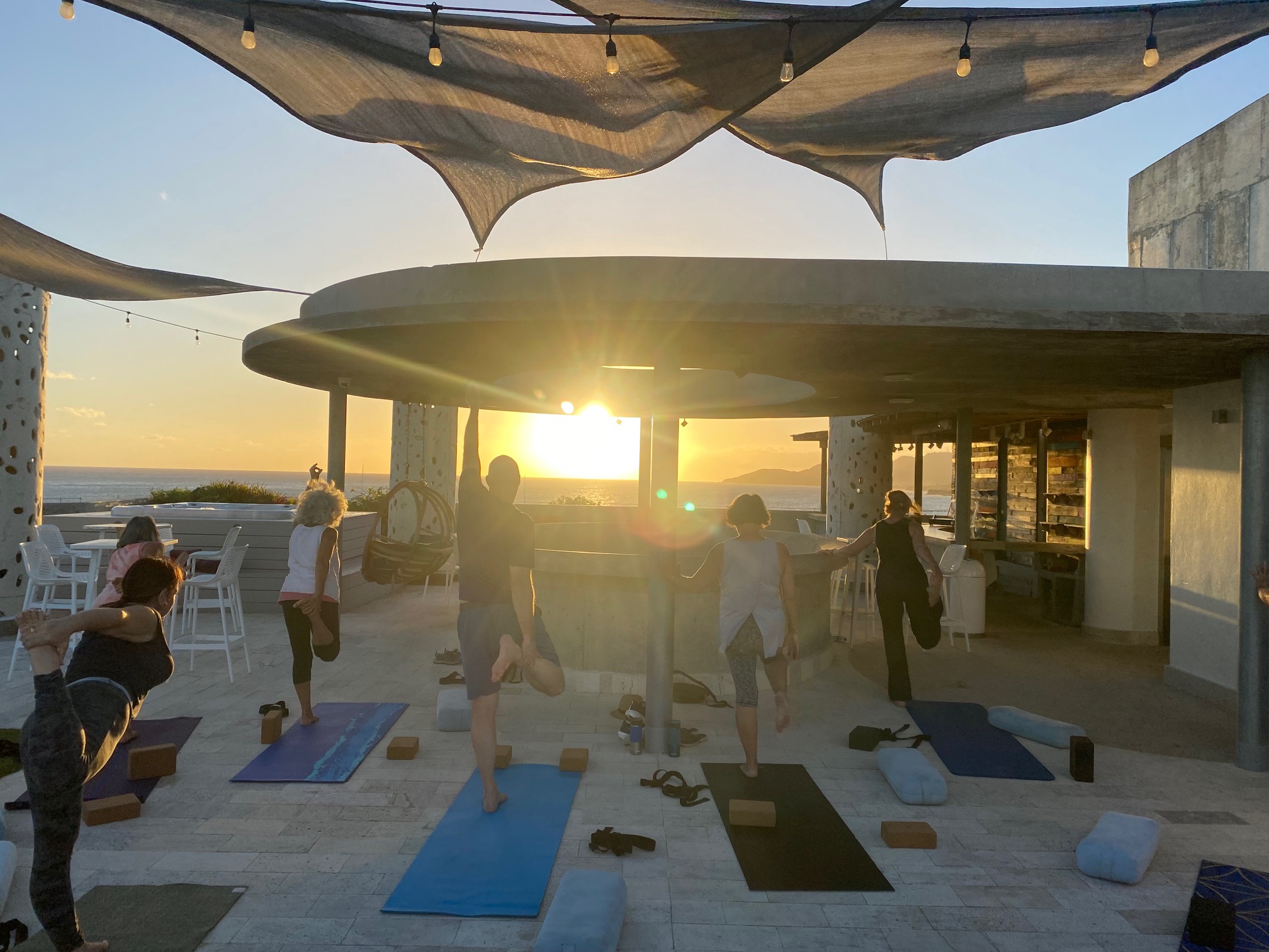 sunset yoga class dancer pose