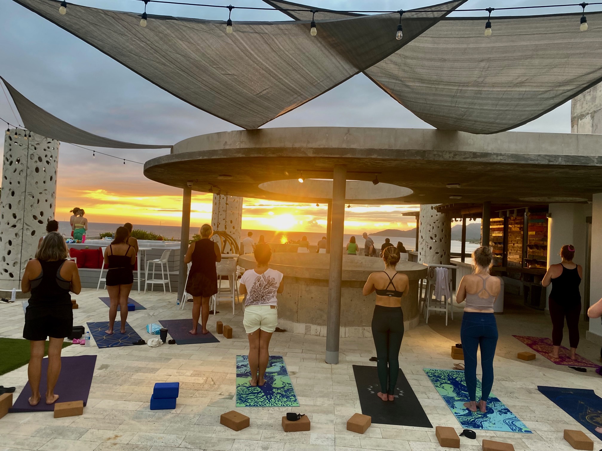 sunset yoga flow on the rooftop at el blok hotel 